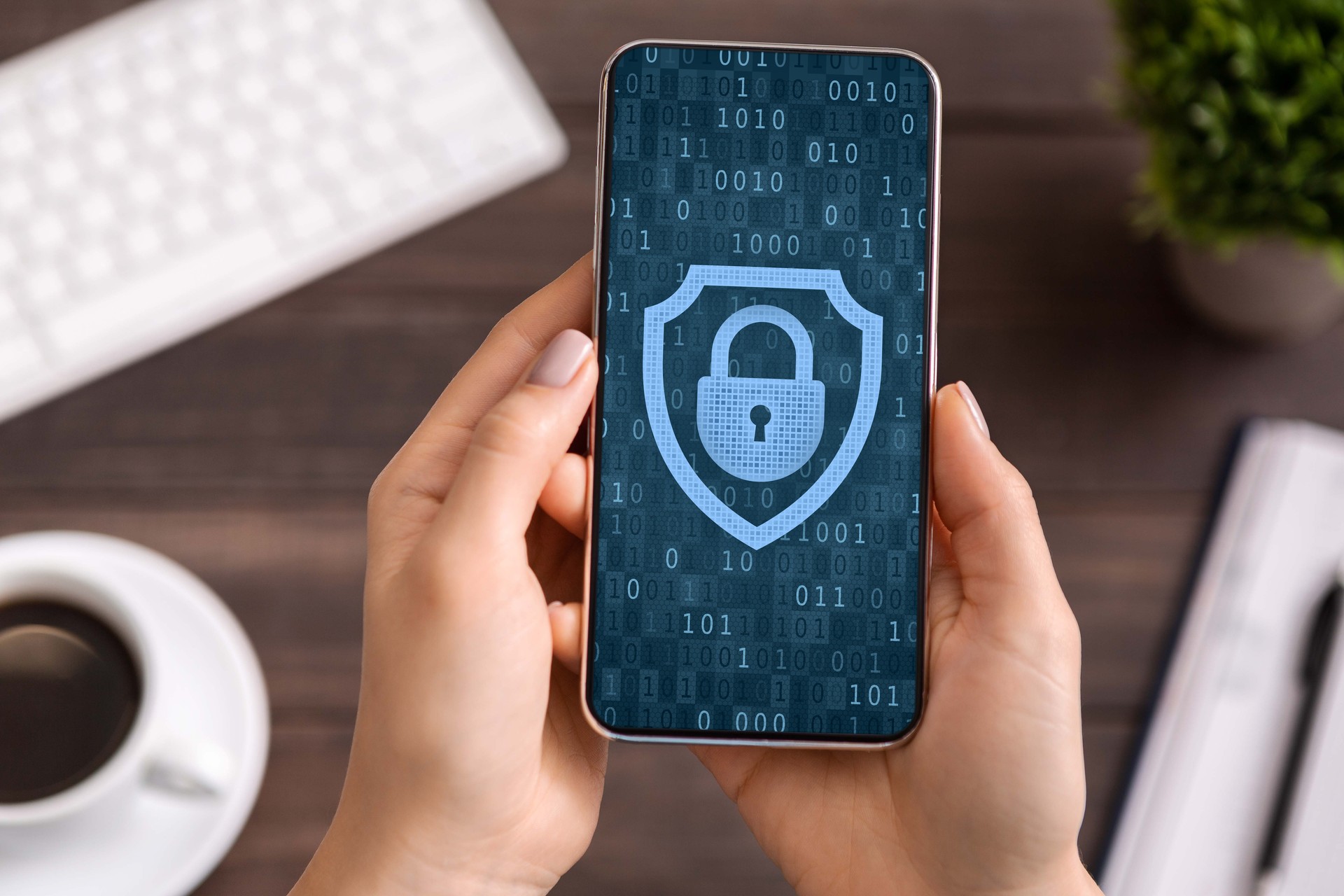 Woman using mobile phone, padlock icon on blue screen